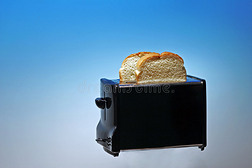 白面包烤面包机照片
