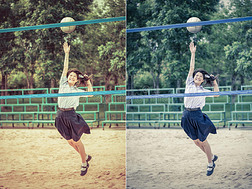 可爱的泰国女学生正在穿着复古颜色的校服打沙滩排球。 专注于模特的脸。
