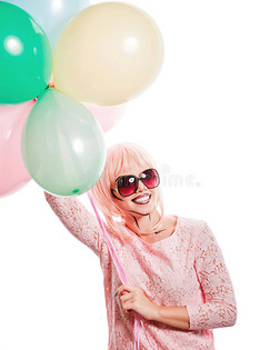 女孩化妆风格的流行艺术和气球。